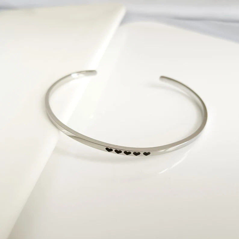 Personlig mansjettarmbånd